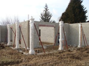Coop matériaux Lusitane matériaux colonne beton chantier mise en œuvre ref K Chevry Cossigny